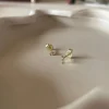Oorbellen 14k double diamond studs